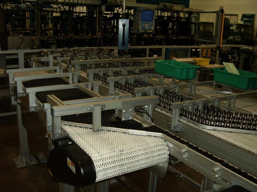 FlexLink conveyor system installation by Anton Installers Inc. — industrial assembly line conveyor, Bucks County PA