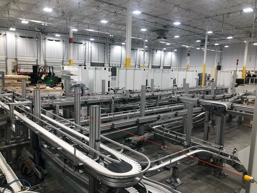 Large-scale FlexLink conveyor system installation in warehouse facility — Anton Installers Inc. authorized installer Pennsylvania
