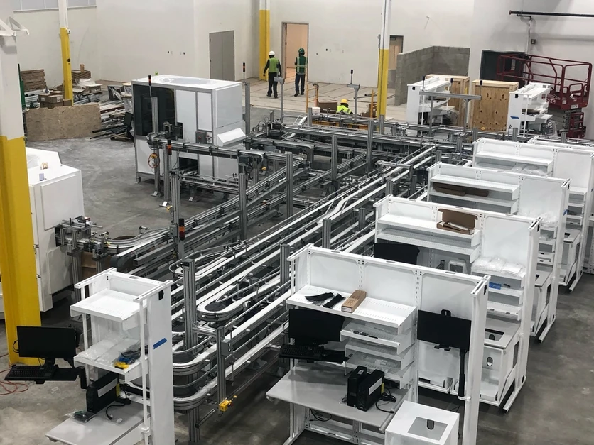 FlexLink conveyor and workstation installation in industrial facility — Anton Installers Inc. Pennsylvania