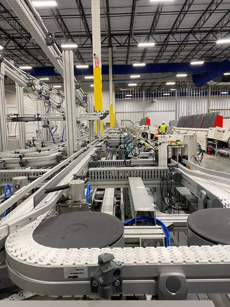 FlexLink conveyor system installation with turntables — authorized installer Anton Installers Inc. Pennsylvania