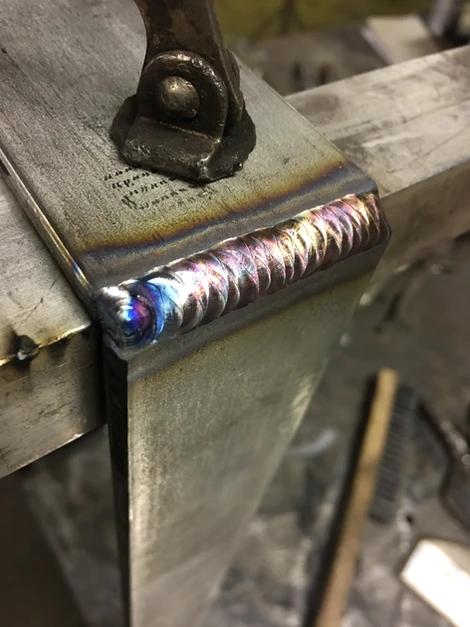 Close-up certified weld joint on structural steel — industrial welding by Anton Installers Inc. Pennsylvania