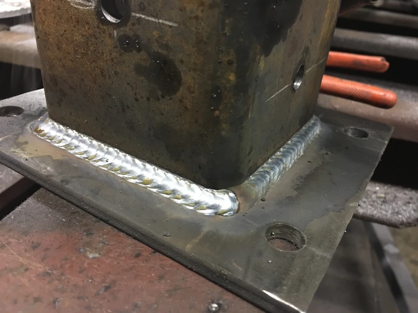 Certified structural steel weld on base plate — precision industrial welding by Anton Installers Inc. Pennsylvania