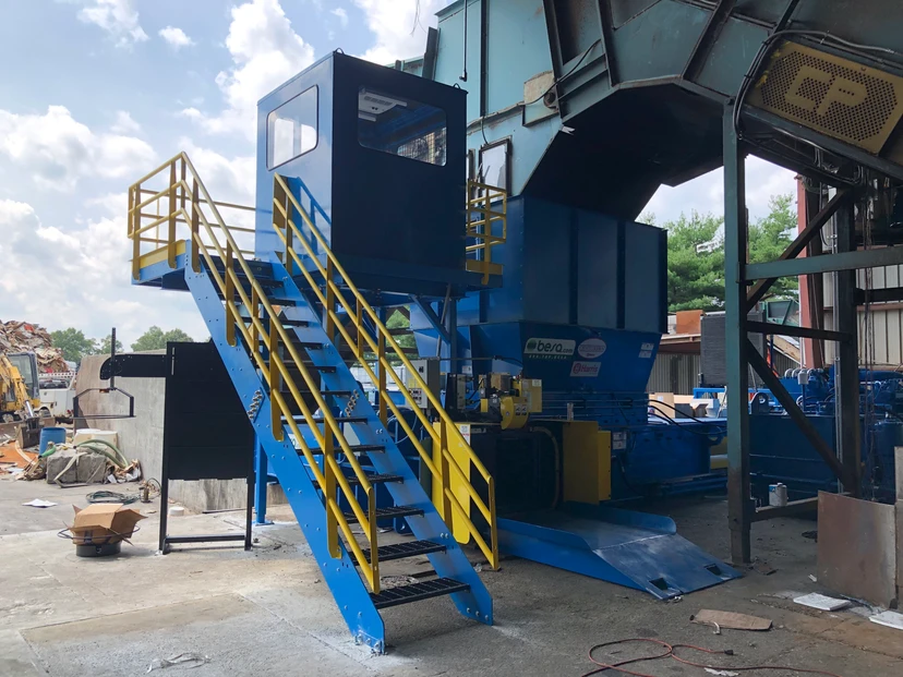 Heavy equipment installation — industrial machinery platform and staircase fabricated and installed by Anton Installers Inc.