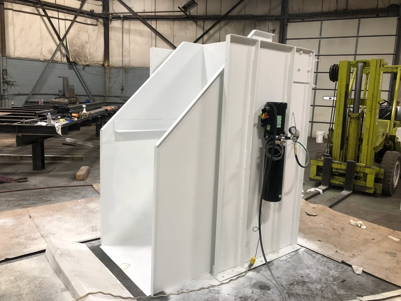 Custom fabricated industrial hopper with hydraulic unit — metal fabrication by Anton Installers Inc. Bucks County PA
