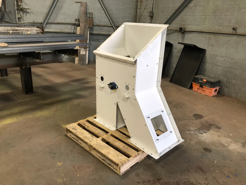 Custom fabricated industrial hopper on pallet — precision steel fabrication by Anton Installers Inc. Pennsylvania